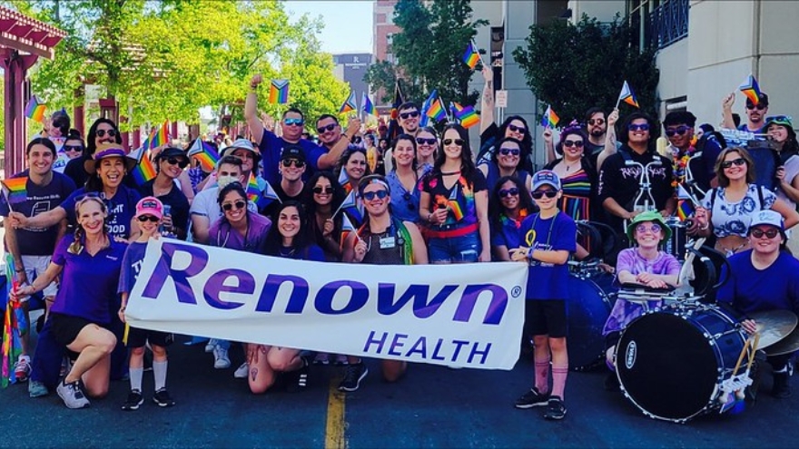 Renown employees pose for a group photo at the Northern Nevada Pride Parade.